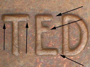 1910 wheat penny doubled die reverse error showing doubling in E PLURIBUS UNUM inscription on the reverse