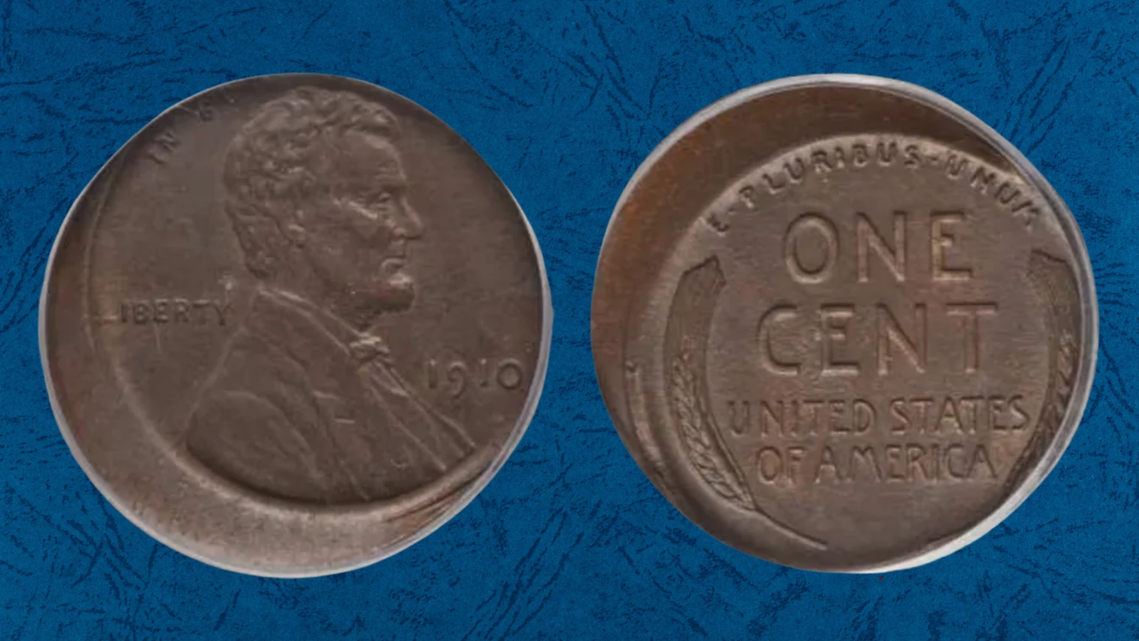 1910 wheat penny off-center strike error showing Lincoln design shifted off the planchet with blank crescent visible